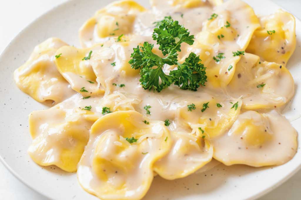 Ricetta ravioli in crema di funghi porcini e formaggio